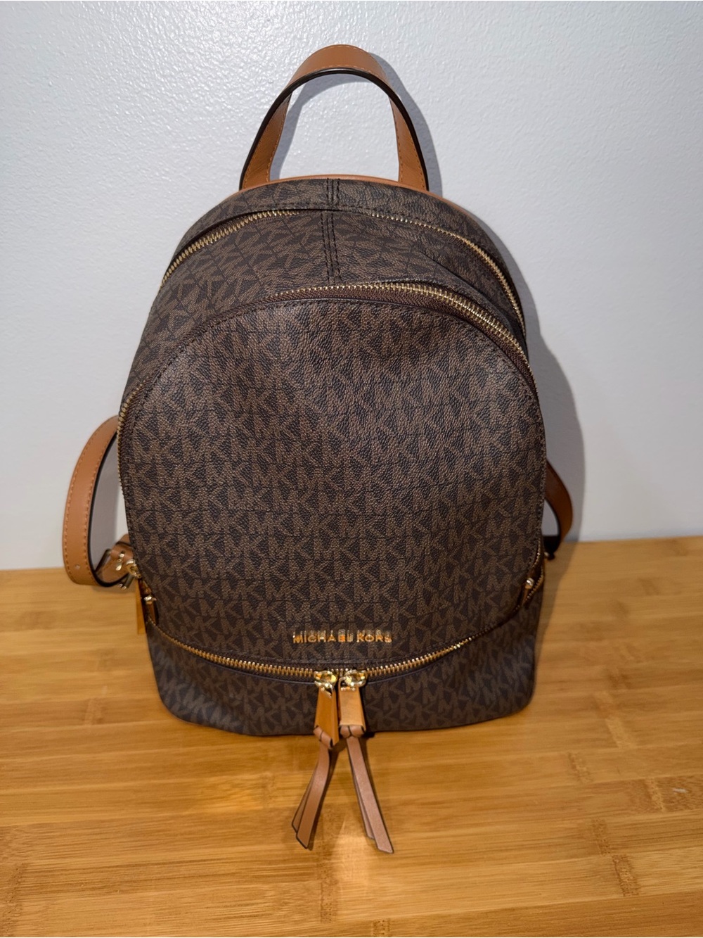 Michael Kors Rhea Medium Backpack in Signature Brown MK logo canvas